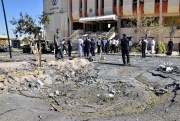 Egyptian security forces inspect the site of a suicide car bombing by Ansar Beit al-Maqdis in the Sinai town of el-Tor, Egypt, Oct. 7, 2013 (AP file photo by Mostafa Darwish).