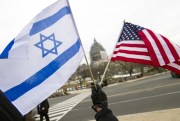 A pro-Israel demonstrator waves flags near the Capitol in Washington, D.C., March 3, 2015 (AP photo by Cliff Owen).