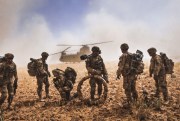 Soldiers of the 82nd Airborne Division gather their equipment before boarding a CH-47F Chinook, Nawa Valley, Kandahar Province, Afghanistan, May 25, 2014 (U.S. Army photo by Staff Sgt. Whitney Houston).