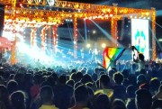 Fans of the Lebanese rock group Mashrou' Leila wave a rainbow flag at a concert in Cairo, Egypt, Sept. 22 2017 (DPA photo by Benno Schwinghammer).