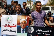 Pro-Hamas protesters during a demonstration against a speech by Palestinian President Mahmoud Abbas that threatened more financial pressure on Gaza, in front of the Palestinian Legislative Council, Gaza City, March 21, 2018 (AP photo by Adel Hana).