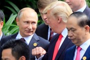 Russian President Vladimir Putin and U.S. President Donald Trump at a photo session during the Asia-Pacific Economic Cooperation summit, Danang, Vietnam, Nov. 11, 2017 (AP photo by Hau Dinh).