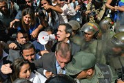 Opposition leader Juan Guaido demanding that the National Guard let him and all opposition lawmakers into the National Assembly in Caracas, Venezuela, Jan. 7, 2020 (AP photo by Matias Delacroix).