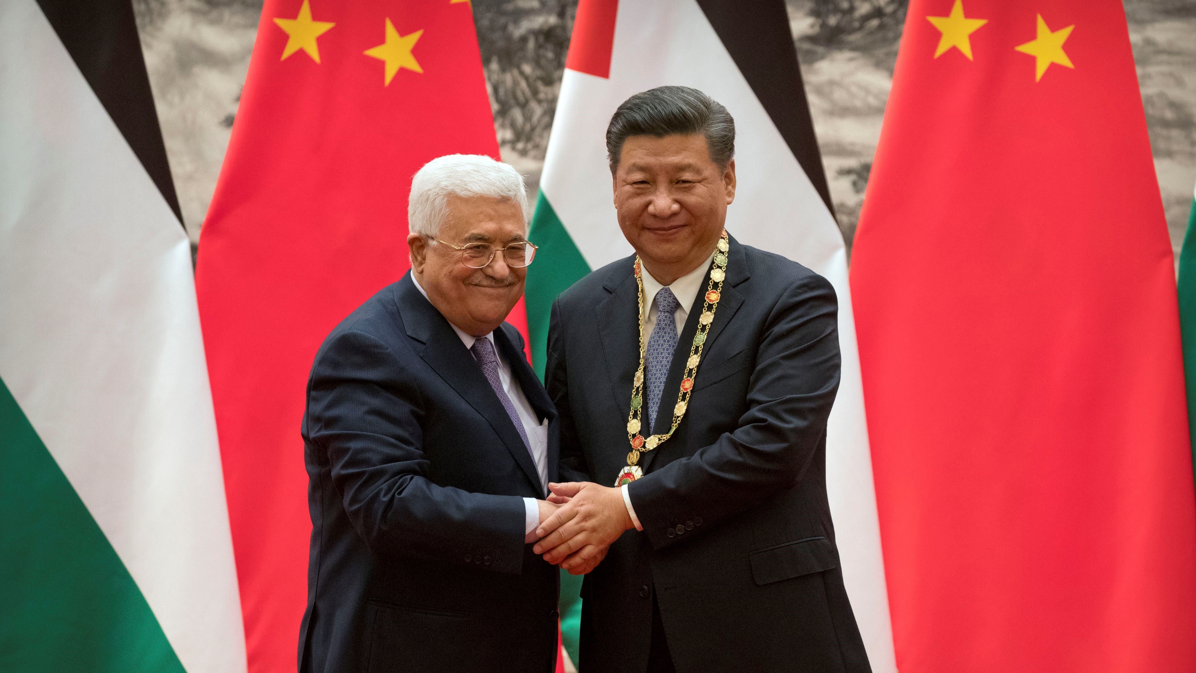 中国国家主席习近平和巴勒斯坦民族权力机构主席阿巴斯。