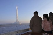North Korean leader Kim Jong Un watches what Pyongyang says is a test launch of an intercontinental ballistic missile.