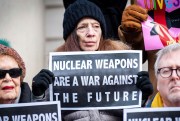 Activists protest against investment in the nuclear weapons industry.