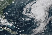 A satellite image shows Hurricane Ernesto.