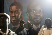 A billboard featuring then-presidential candidate Bassirou Diomaye Faye and opposition leader Ousmane Sonko in Senegal.