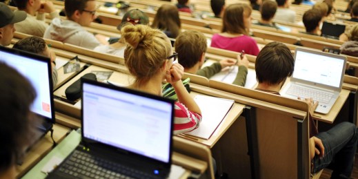 Students sit in a lecture at the University of Leipzig.