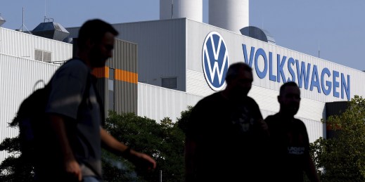 Employees leave a Volkswagen plant.