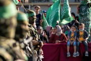 Children wait for an appearance by Yahya Sinwar.