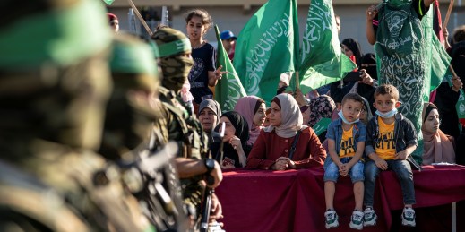 Children wait for an appearance by Yahya Sinwar.