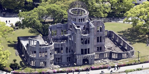 People walk past the Atomic Bomb Dome in Hiroshima, Japan.