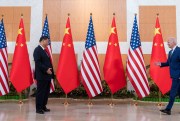 U.S. President Joe Biden walks to greet Chinese President Xi Jinping.