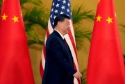 Chinese President Xi Jinping walks to greet U.S. President Joe Biden.