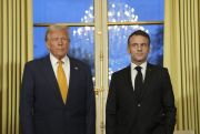 French President Emmanuel Macron poses with U.S. President-elect Donald Trump.