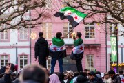 Syrian refugees celebrate the fall of the Assad regime, in Mainz, Germany.